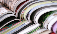stack of open magazines, close-up