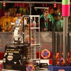 students and their robots at the FIRST competition