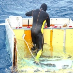 diver with debris from Air France Flight 447