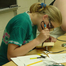 student soldering