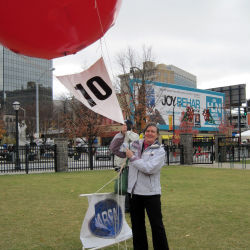 GTRI Research Scientist Betty Whitaker with DARPA red balloon