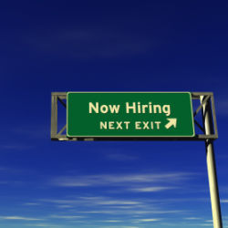 Now Hiring freeway sign