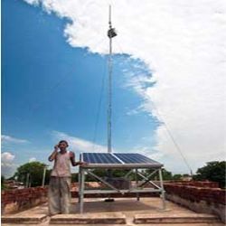 Low-power cell phone base station made by VNL on rural rooftop in India. 