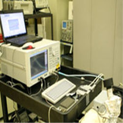 Experimental system transfers data at one gigabit per second. Infrared laser (black device on right) transmits the data. 