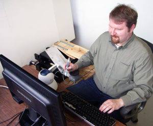 University of Utah researcher Will Provancher with the Active Handrest 