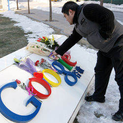 laying flowers at Google China headquarters