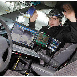 helmeted driver in autonomous vehicle