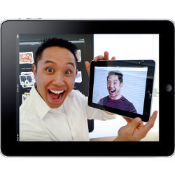 iPad displays user holding iPad