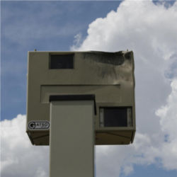 Speed camera w/bullet hole