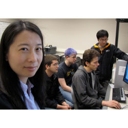 South Dakota State University professor Yi Liu, software students