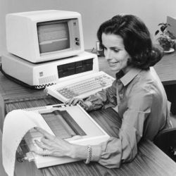 IBM 5150 with woman