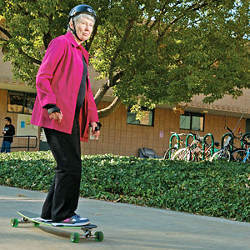 Harvey Mudd College President Maria Klawe on a skateboard