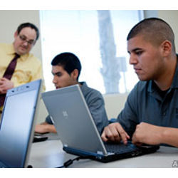 students with laptop computers