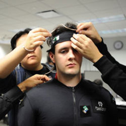 Worcester Polytechnic Institute student fitted for motion capture suit 