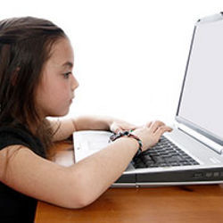 female student at laptop computer