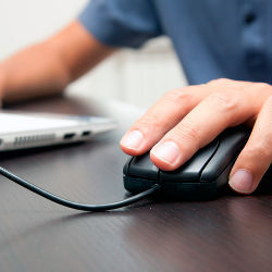 hand on computer mouse