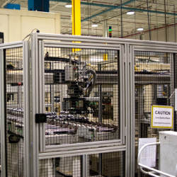 caged robotic machinery