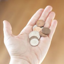 hand with loose change