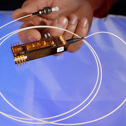 A miniaturized quantum computing transmitter