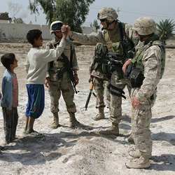 Marines greeting local children