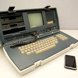 A 1982 Osborne Executive "portable" computer and a recent iPhone.