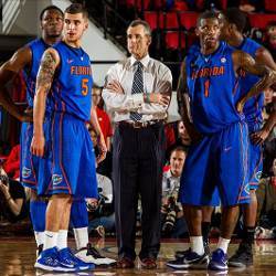 Florida Gator basketball players and coach Billy Donovan