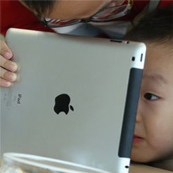 Child and tablet