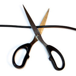 A scissor cutting a cable. 