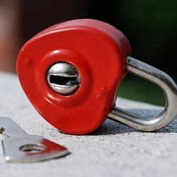 A heart-shaped lock and its key.
