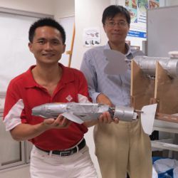 NUS Zhang Heng Wei and Ren Qinyuan with robotic fish