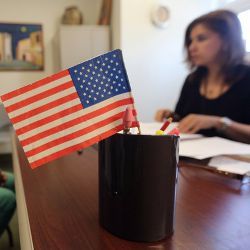 American flag on business desk