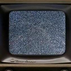 A television displaying visual static. 