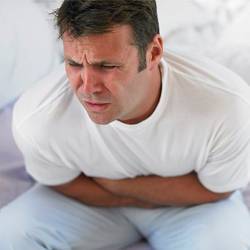 A man suffering from food poisoning.