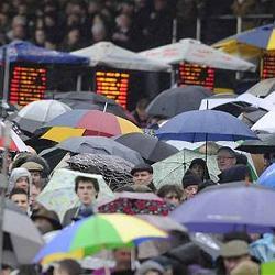 A crowd in the rain.