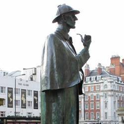 A statue of Sherlock Holmes near his fictional 221b Baker Street resident, in London.ar his 