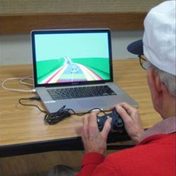 senior gamer playing NeuroRacer