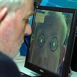 UK Home Secretary Charles Clarke trying an iris scanner in 2005.