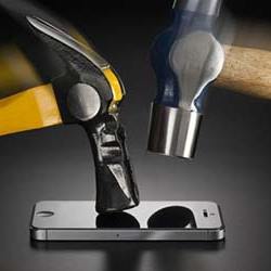 Hammering on a smartphone handset.