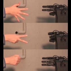 robot playing rock-paper-scissors