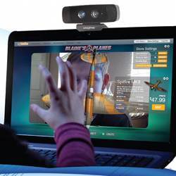 A gamer controls a computer game with gestures.