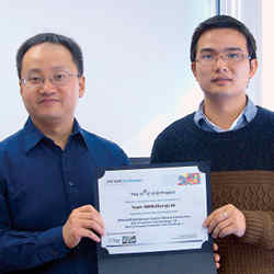 NMSU computer science professor Joe Song, left, and doctoral student Yang Zhang.
