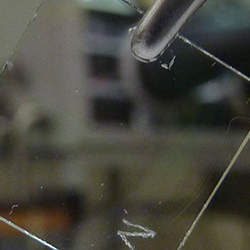 Transparent transistors on a postage-stamp-sized piece of glass.