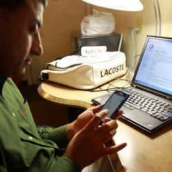 Sajjad Altaf, of Findlay, Ohio, edits Wikipedia on a laptop, but increasingly uses a mobile phone.