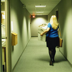 A woman leaving her job. 