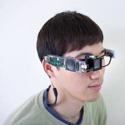 A test subject wearing the K-Glass head-mounted display.