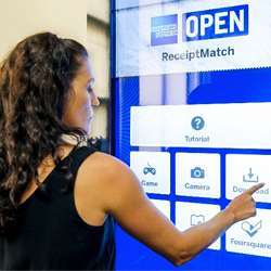 A multi-use AmEx HCI kiosk had visitors lining up to recharge their mobile devices.  