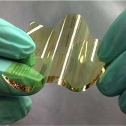 A Stanford engineer demonstrates the flexibility of a carbon nanotube circuit. 