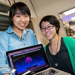 Engineering students Cecilia Zhang, left, and Lam Yuk Wong have created a virtual fitting room for online shoppers. 