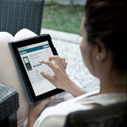 student with electronic tablet