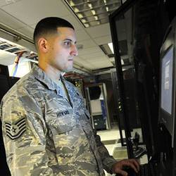 A non-commissioned officer with the 627th Communications Squadron works on a computer system at Joint Base Lewis-McChord in Washington, DC.